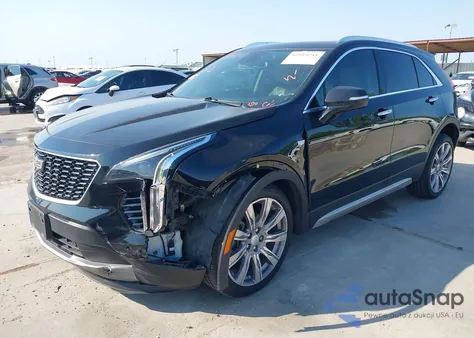2021 Cadillac Xt4 Fwd Premium Luxury from USA, damaged, VIN 1GYFZCR46MF015221